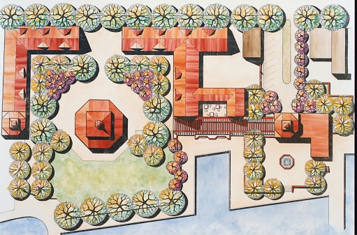 This is a watercolor designed, drawn and painted by the photographer.  It is a make believe site, not a real project.  It was done as a student excercise for painting and site layout technique.  It shows a gazebo surrounded by a community development with shopping, an outdoor cafe, parking, and fountain by a large boat slip. more of this plan.
