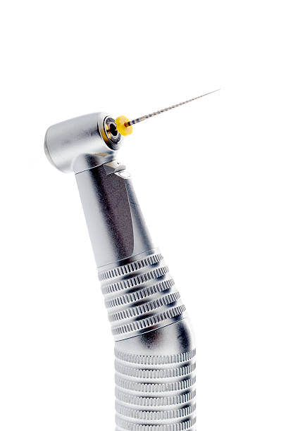 dental drill isolated on white a dental drill (properly called a handpiece) isolated on a white background dental drill stock pictures, royalty-free photos & images