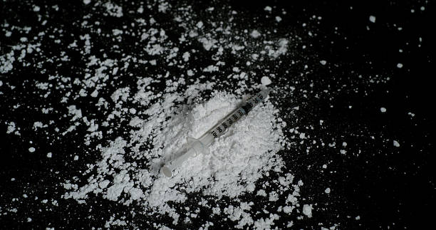 istock Drug, Cocaine against black background 1727872812