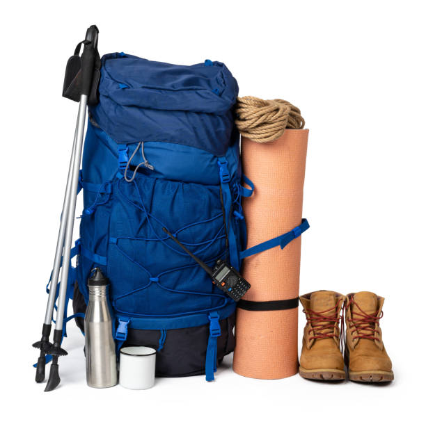 Blue hiking backpack with fitness mat isolated on white Blue hiking backpack with fitness mat isolated on white background luggage strap stock pictures, royalty-free photos & images