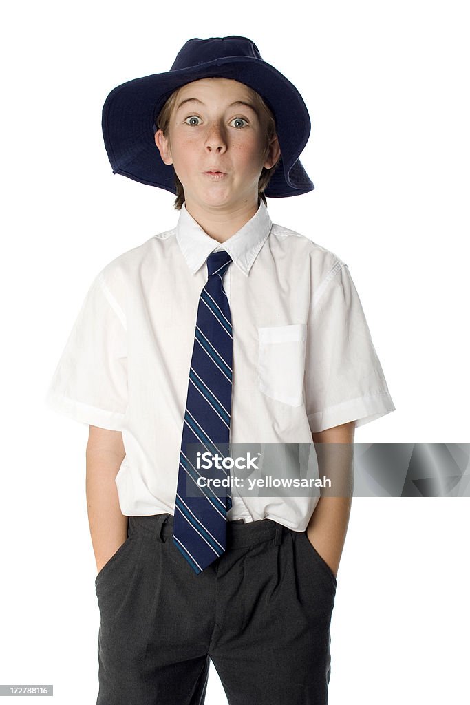 School Boy In Hat And Tie A school boy in uniform wearing a hat and tie. 12-13 Years Stock Photo