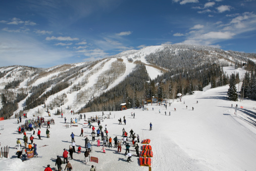 Snowy mountains on a sunny day at a ski resort in Utah.