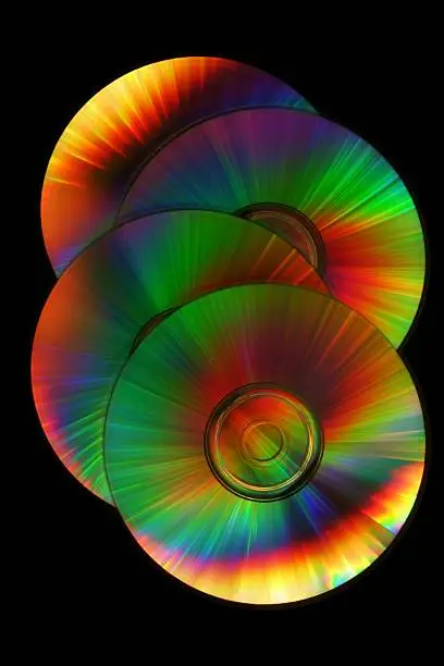 4 CDs/DVDs showing off their prism effect on light.All images in this series...