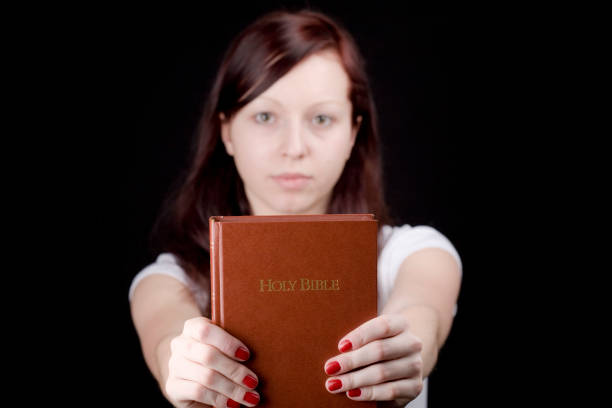 istock Young girl with bible 172788798