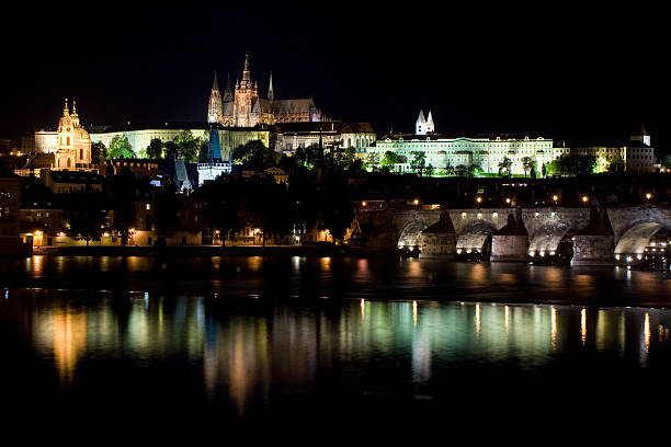 istock Charles bridge and Prague's castle illuminated at night 172789067