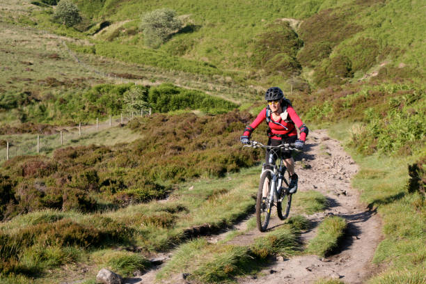 istock Woman on a Mountain Bike 172789089