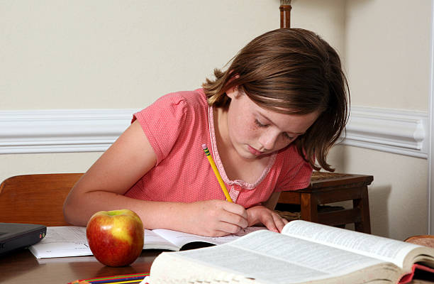 Reading  See others from this series Child reading the dictionary urban dictionary stock pictures, royalty-free photos & images