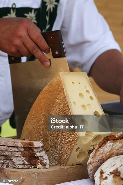 Slicing Cheese Stock Photo - Download Image Now - Cheese, Switzerland, Emmental Cheese
