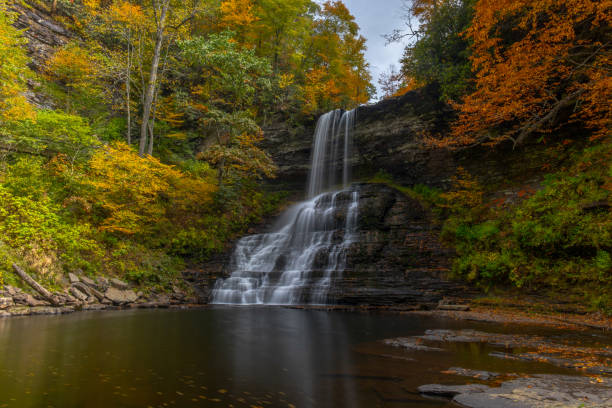 istock Cascades Waterfall with autumn colors 1727911792