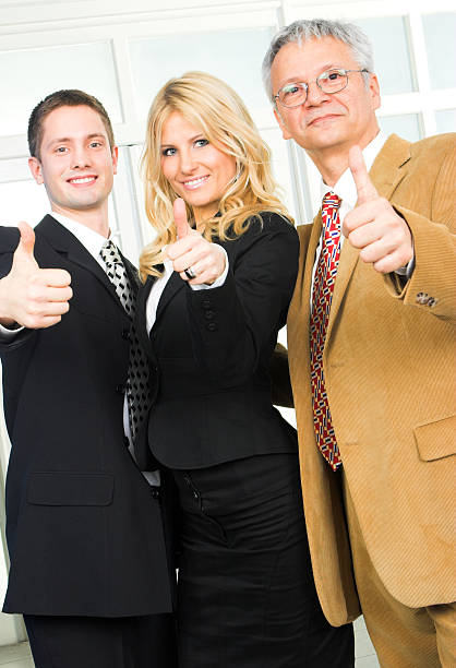 istock Businesspeople, all ages, thumbs-up 172791825