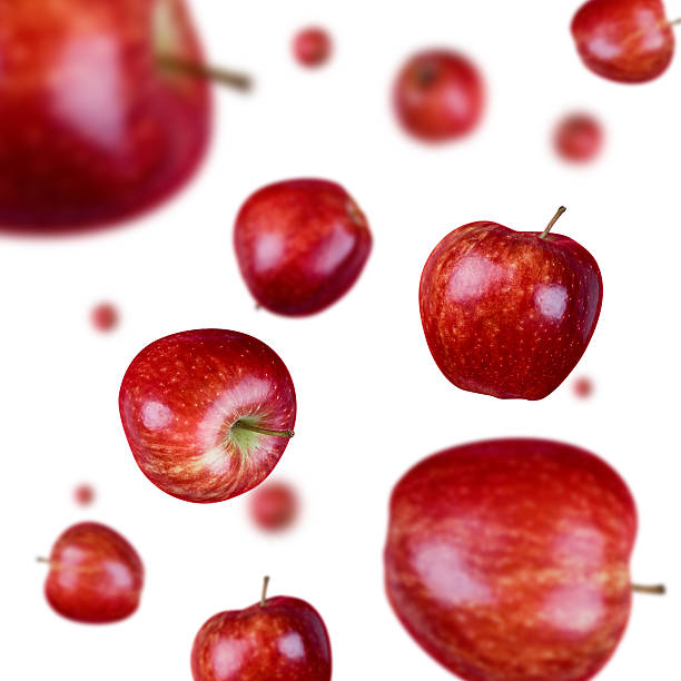 An image of raining red apples stock photo