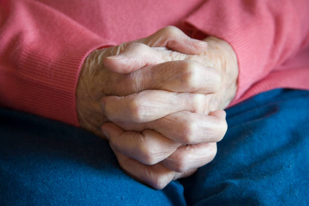 Elderly Clasped Hands stock photo