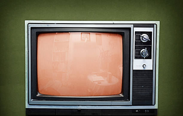 istock Old television set on a green background 172791943