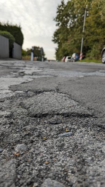 istock warning against damaged roadway 1727926459