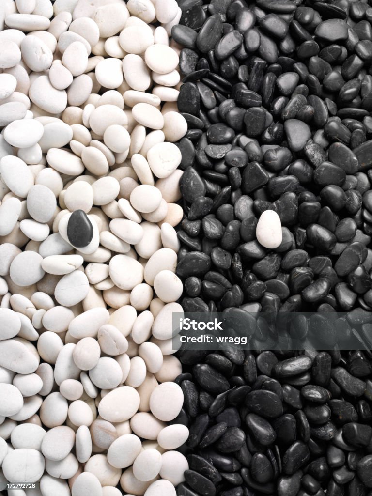 Gli opposti, bianco e nero Detriti - Foto stock royalty-free di Bianco