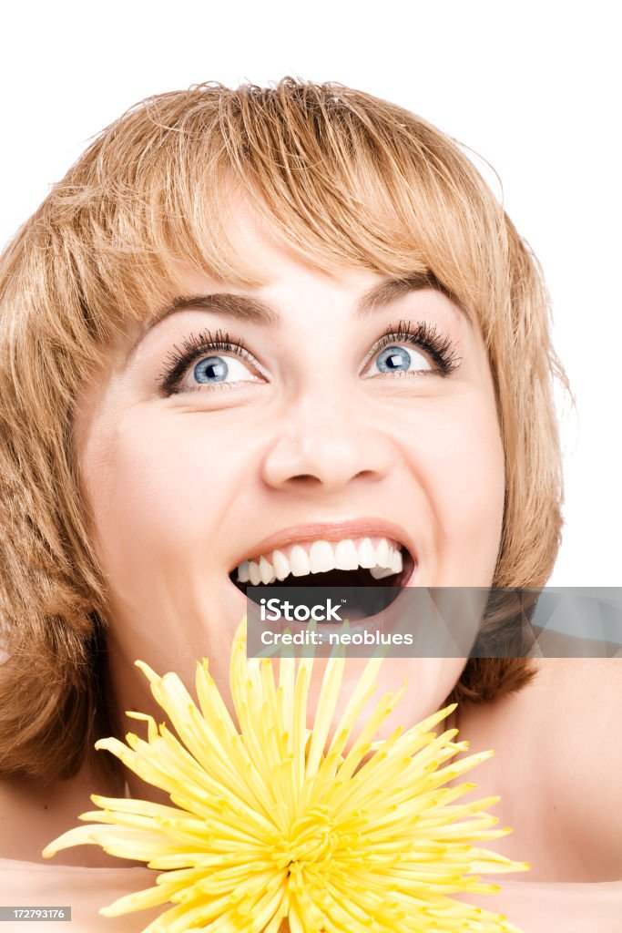 Mature beauty Close-up of beautiful Mature face with flower 30-39 Years Stock Photo