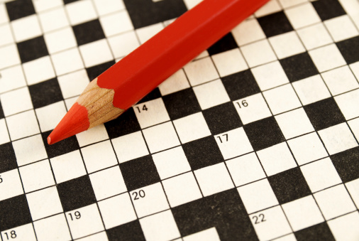 Red Pencil Crayon On Top Of Crossword Puzzle Stock Photo Download Red Pencil Crayon On Top Of Crossword Puzzle Stock Photo Download