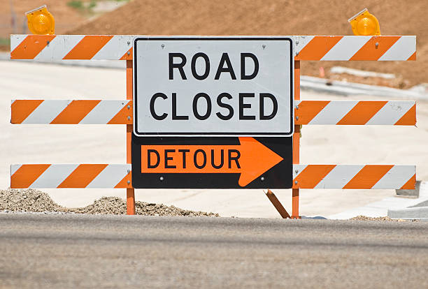 Road Closed/Detour Sign Oops! Road closed.  Every life runs into the same situation at one time or another. road closed sign horizontal road nobody stock pictures, royalty-free photos & images