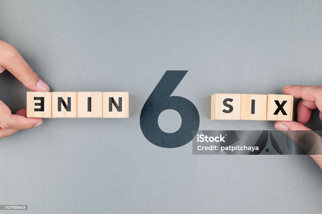 Six or Nine, from the different perspectives and points of view Six or Nine, different answers from the perspective and point of view, opposite view from the above shot Point of View Stock Photo