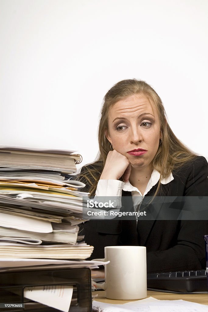 Overworked 3 Young woman feeling the stress of endless office work. 20-24 Years Stock Photo