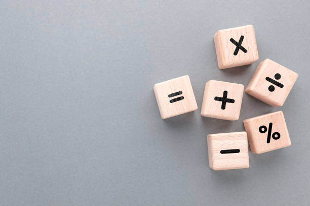 istock Mathematics operation signs by wood cubes 1727936570