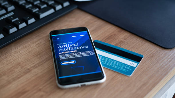 istock Artificial intelligence application on phone screen and credit card on the table 1727940533