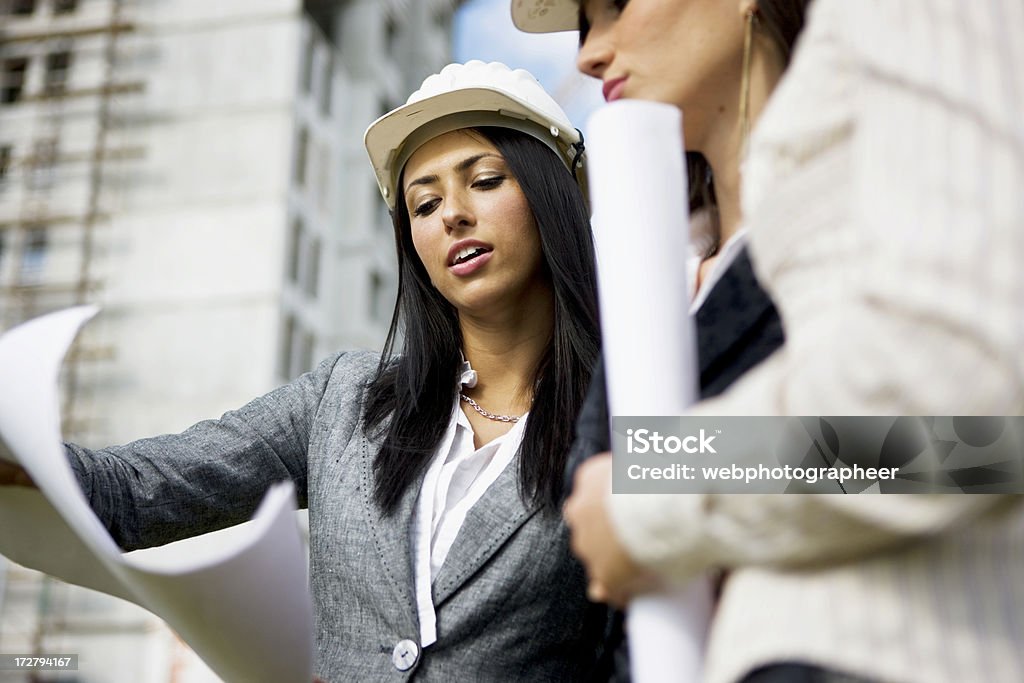 Travail d'équipe de Construction - Photo de Adulte libre de droits