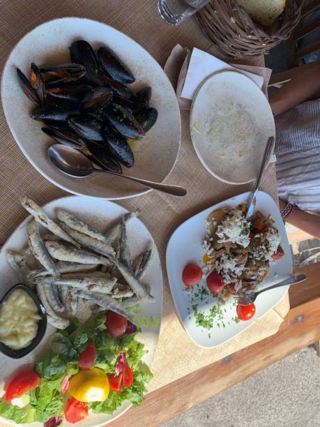 istock Traditional greek food in a tavern, fried fish 1727943905