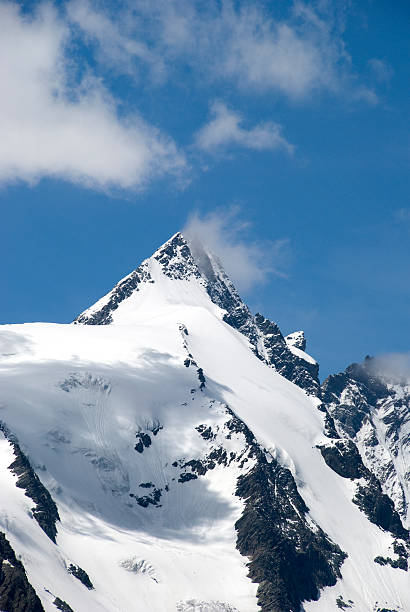 Gross Glockner "Gross Glockner Mountain; the highest mountain of Austria (3798 meter/12,461 feet).Related images;" grossglockner stock pictures, royalty-free photos & images