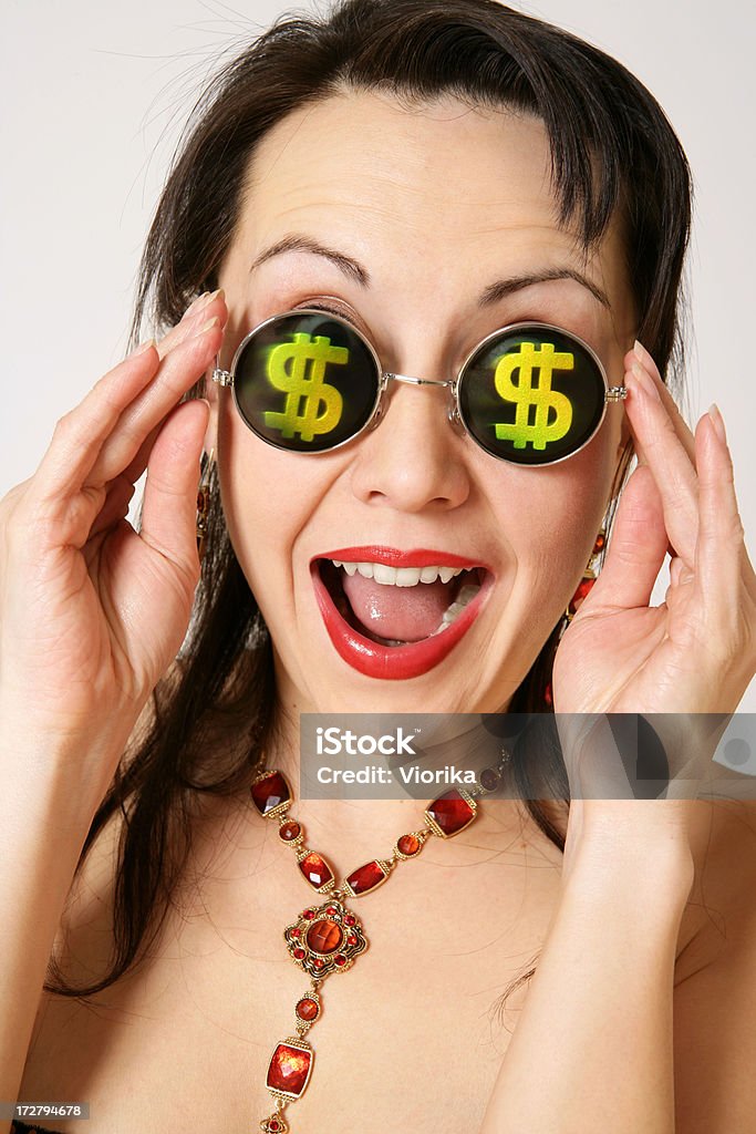I want money!!! Woman with green dollar signs at her glasses. Adult Stock Photo