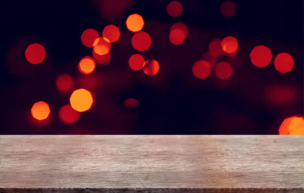 istock Empty wooden table on room cocktail club with bokeh blurred background. 1727947131