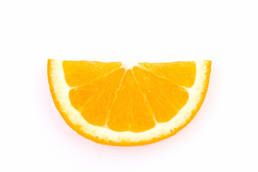 Ripe orange fruits and orange slices levitating in air on white background. File contains clipping path.
