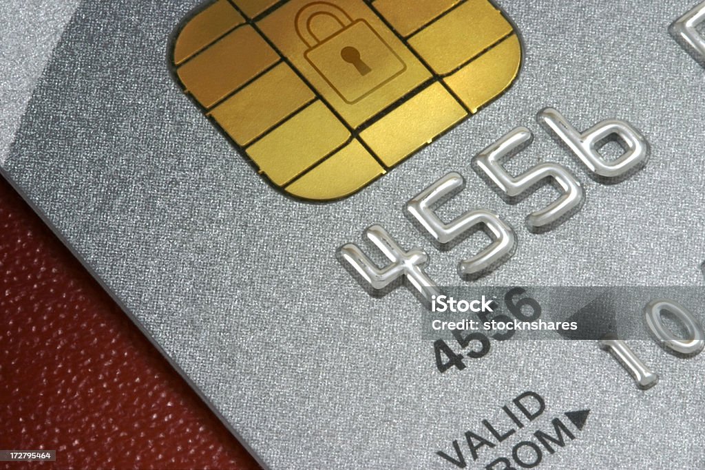 Credit Card Data "Platinum Credit Card macro, with data holding microhip and safety padlock icon. Chip & Pin technology. Good for all concepts concerning credit card safety and data protection." Credit Card Stock Photo