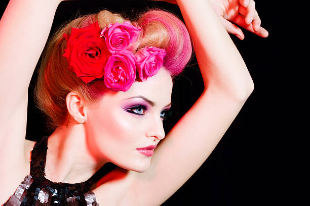 Fashion model with roses in her hair.