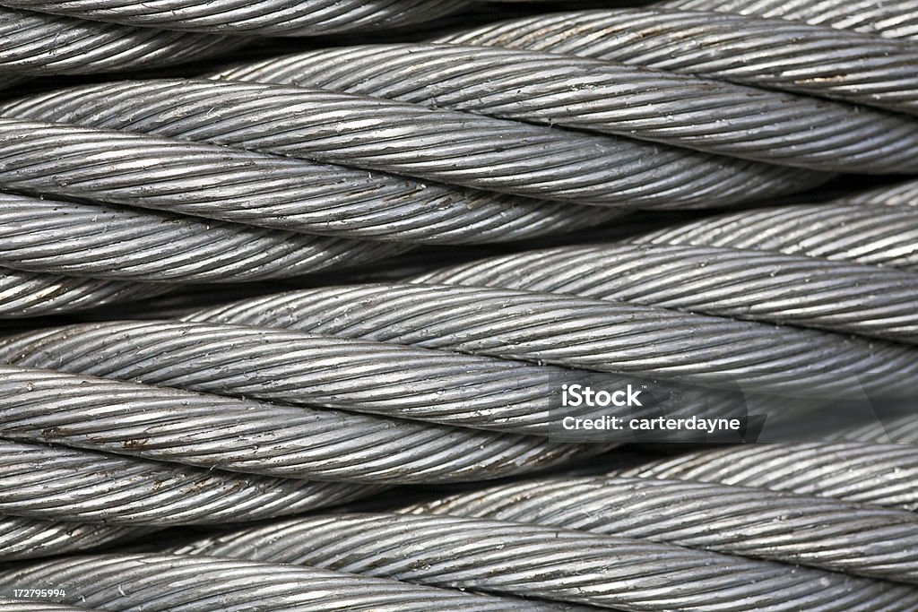 Close up of large industrial metal cable; background. "A close of metal cable, for background.  See some similar images below or check out my lightbox:" Wire Rope Stock Photo