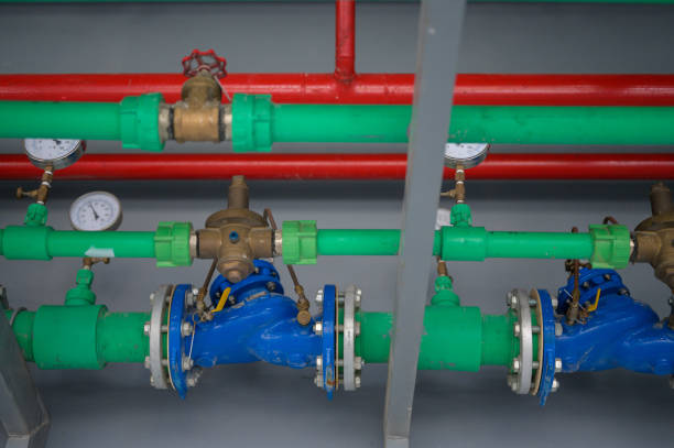 istock Open system Water mains and drainage under ceiling of building in condominium parking floor  Plumbing piping concept. 1727961998