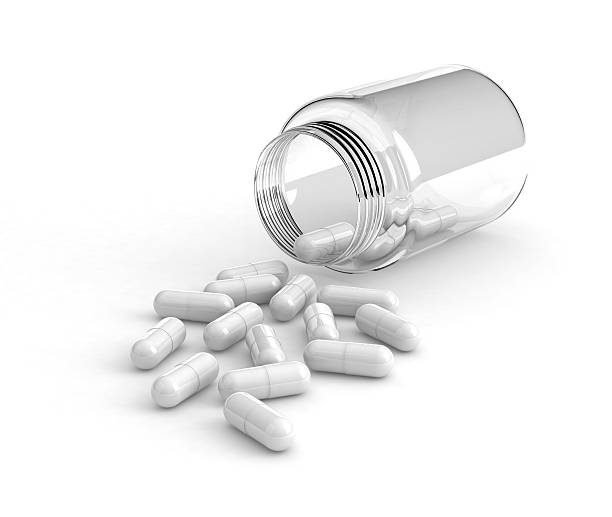 белые таблетки - pill bottle bottle medicine white стоковые фото и изображения