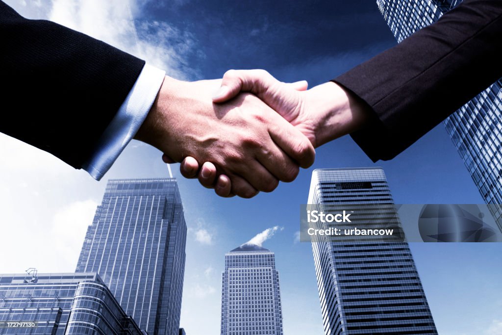 Business deal Handshake in the city Black Color Stock Photo