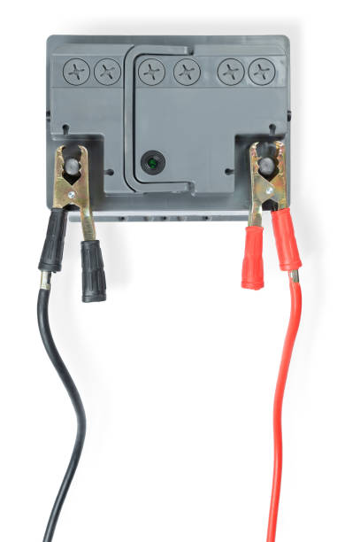 istock Car battery with connected wires top view, isolated on white background. File contains a path to isolation 1727972084
