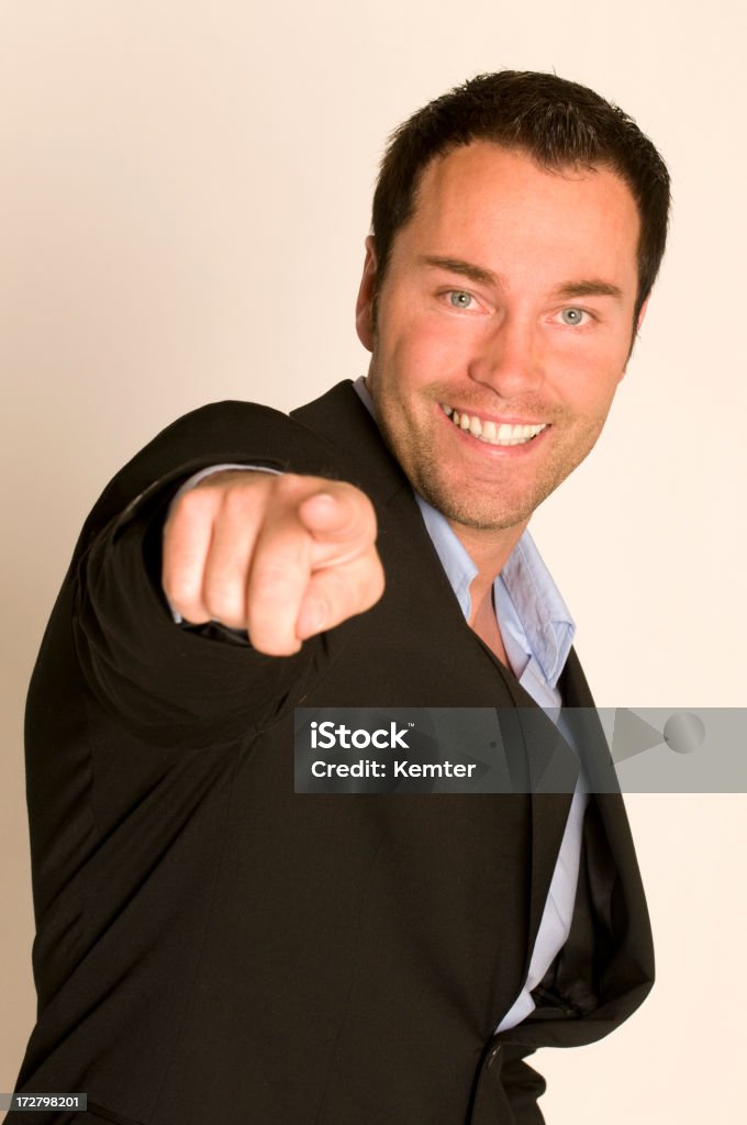 YOU!!!! businessman showing at camera - focus on face 30-39 Years Stock Photo