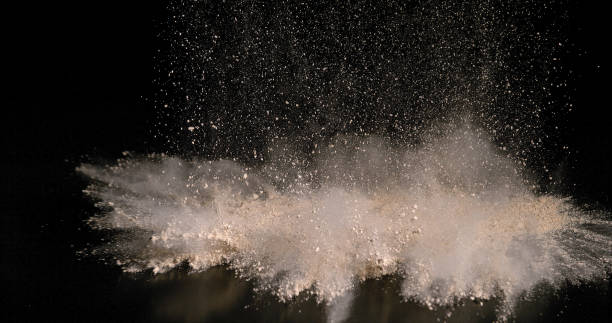 istock Garlic, allium savitum, Garlic powder Falling on Black Background 1727986382