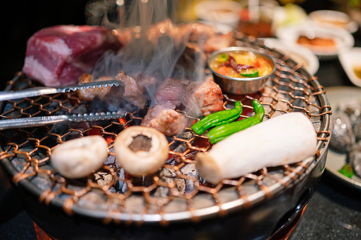 Korean culture traditional food Grilling korean food in local restaurant