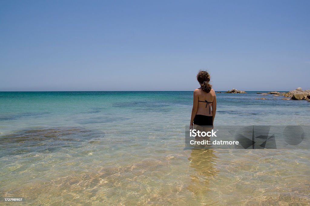 Baja beach Young teenage girl wading in the Sea of Cortes at Cabo Pulmo, Baja California Sur. Active Lifestyle Stock Photo
