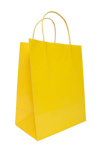 istock Yellow shopping bag isolated on a white background 172798945