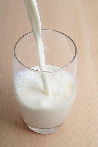 istock Pouring Milk in to a Glass 172799653