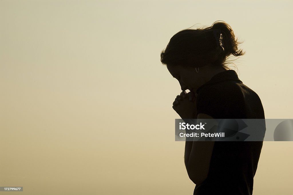 Prayer Silhouette A women praying.Similar Images: Praying Stock Photo