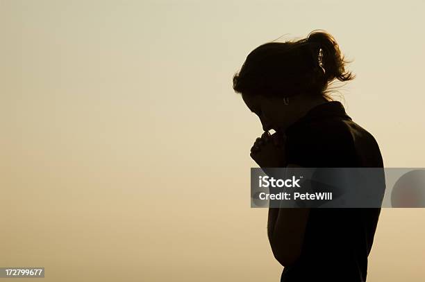 Prayer Silhouette Stock Photo - Download Image Now - Praying, Women, One Woman Only