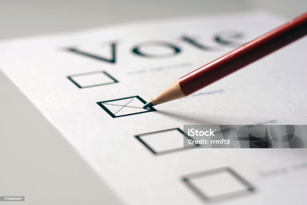 Vote This is a voting card marked with an x in the second box with a pencil.  The focus is on the pencil tip. Voting Stock Photo