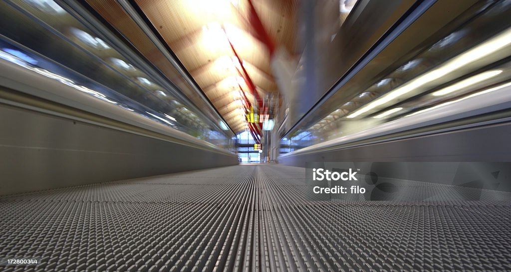 Airport Moving Walkway A moving walkway at an airport. Activity Stock Photo