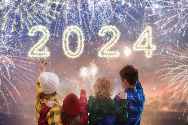 happy new year. family watching fireworks. - new year people family offspring imagens e fotografias de stock